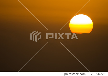Sunrise from the island of Gran Canaria. Sunrise from the island of Gran Canaria. 125096725