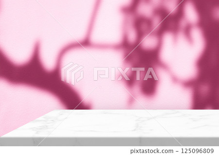 Minimal White Marble Table Corner with Shadow and Pink Light Beam on Concrete Wall Background Minimal White Marble Table Corner with Shadow and Pink Light Beam on Concrete Wall Background 125096809