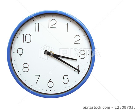 Wall clock with blue frame showing 3.20 03.20 or 15.20 O clock  on white background, suitable for time related articles, education, or punctuality concepts 125097033