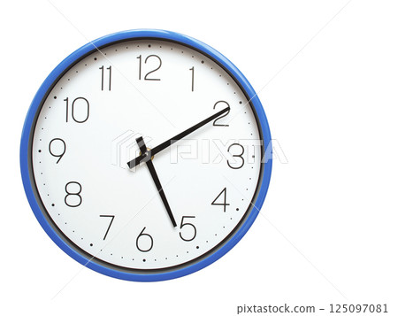 Wall clock with blue frame showing 5.10 05.10 or 17.10 O clock on white background, suitable for time related articles, education, or punctuality concepts Wall clock with blue frame showing 5.10 05.10 or 17.10 O clock on white background, suitable for time related articles, education, or punctuality concepts 125097081