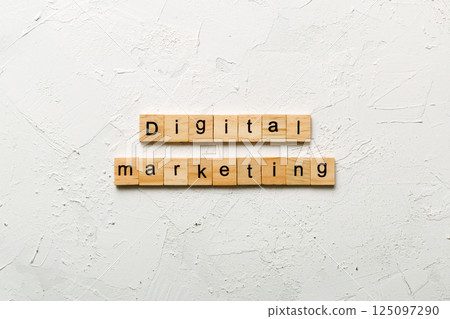 Digital Marketing word written on wood block. Digital Marketing text on cement table for your desing, concept 125097290