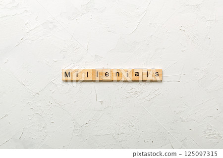 millennials word written on wood block. millennials text on table, concept 125097315