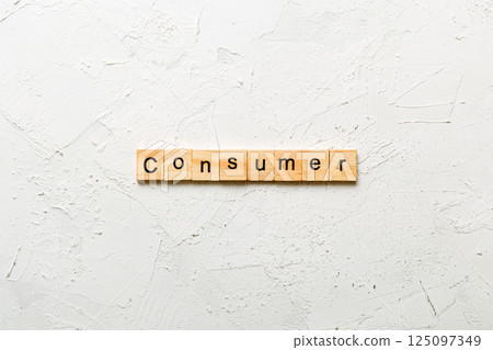 consumer word written on wood block. consumer text on table, concept consumer word written on wood block. consumer text on table, concept 125097349