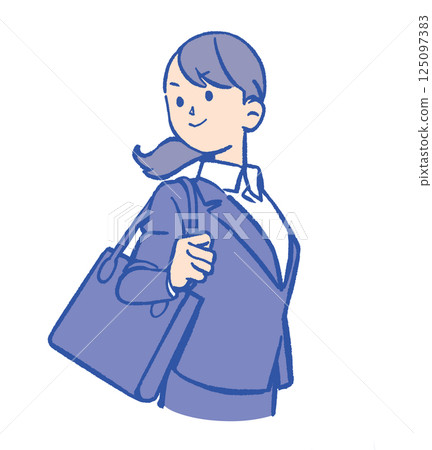 A woman in a suit holding a bag A woman in a suit holding a bag 125097383