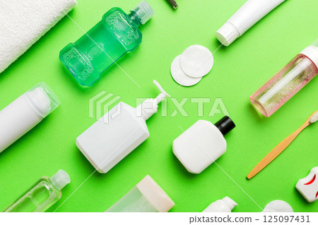 Mockup for bathing products top view flat lay, spa razor, toothpaste, soap, gel and other various accessories. Cosmetics for skin health. Bath Mockup for your logo 125097431