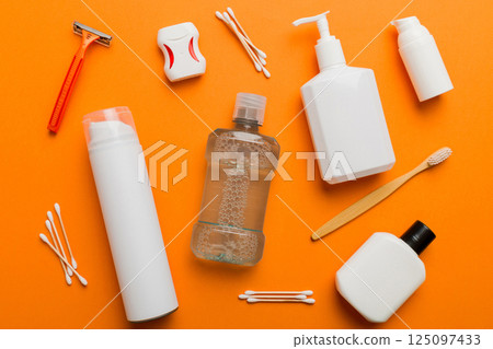 Mockup for bathing products top view flat lay, spa razor, toothpaste, soap, gel and other various accessories. Cosmetics for skin health. Bath Mockup for your logo Mockup for bathing products top view flat lay, spa razor, toothpaste, soap, gel and other various accessories. Cosmetics for skin health. Bath Mockup for your logo 125097433