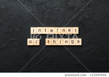 internet of things word written on wood block. internet of things text on cement table for your desing, concept internet of things word written on wood block. internet of things text on cement table for your desing, concept 125097648