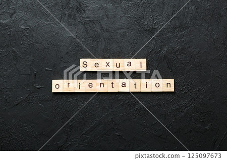Sexual orientation word written on wood block. Sexual orientation text on cement table for your desing, concept Sexual orientation word written on wood block. Sexual orientation text on cement table for your desing, concept 125097673