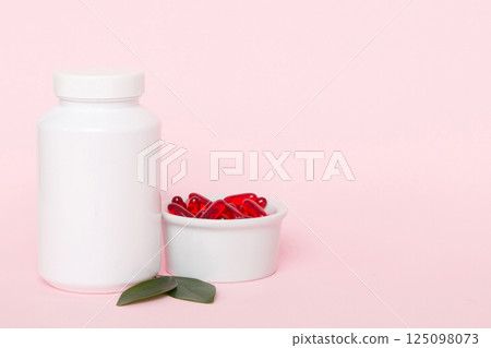 different drugs and health supplement pills with medicine bottle health care and medical top view. Vitamin tablets. Bottle with colored pills on table background. Multivitamins different drugs and health supplement pills with medicine bottle health care and medical top view. Vitamin tablets. Bottle with colored pills on table background. Multivitamins 125098073