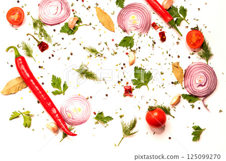 Various vegetables on a white background. Chopped vegetables and spices on a white background. Cooking and preparation. 125099270