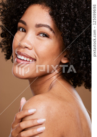 Beauty, skincare and face portrait of black woman with self care wellness, natural cosmetics and luxury facial makeup. Dermatology, healthcare and aesthetic African model isolated on brown background 125099698