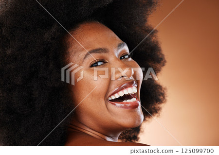 Hair care, black woman and beauty with smile, afro and dental health, white teeth and healthy oral. Happy, cosmetic and skin health of a person with an afro with happiness or content face with joy Hair care, black woman and beauty with smile, afro and dental health, white teeth and healthy oral. Happy, cosmetic and skin health of a person with an afro with happiness or content face with joy 125099700