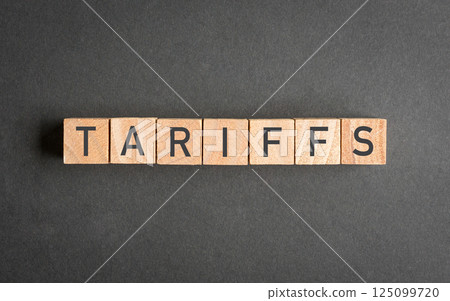 Tariffs, word on square wooden blocks. 125099720