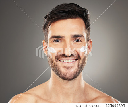 Skincare, health portrait of man with cream on face for anti aging and glowing skin on studio background. Beauty, facial and male model with luxury product for healthy skin treatment and self care. Skincare, health portrait of man with cream on face for anti aging and glowing skin on studio background. Beauty, facial and male model with luxury product for healthy skin treatment and self care. 125099895