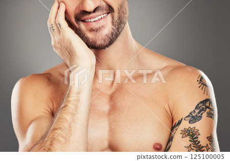 Man, smile and hand on face for happy skincare beauty or skin wellness in studio. Facial healthcare, cosmetics beard care and self care happiness lifestyle for morning routine against grey background Man, smile and hand on face for happy skincare beauty or skin wellness in studio. Facial healthcare, cosmetics beard care and self care happiness lifestyle for morning routine against grey background 125100005