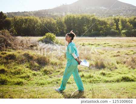 Animal care, working and vet in field walking with clipboard doing research, analytics and inspection. Healthcare, veterinary and black woman medical worker doing work, examination and job in nature 125100602