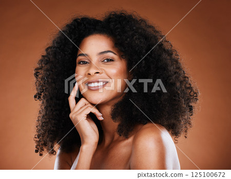 Hair care, beauty and portrait of black woman with afro on brown background in studio for wellness. Beauty, cosmetics and happy female model with glowing skin, healthy and natural curly hairstyle Hair care, beauty and portrait of black woman with afro on brown background in studio for wellness. Beauty, cosmetics and happy female model with glowing skin, healthy and natural curly hairstyle 125100672