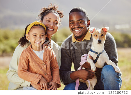 Happy family, dog and portrait and a park, relax and smile while bonding in nature, calm and cheerful. Happy, black family and love with girl, pet and parents enjoying quality time in a forest 125100712