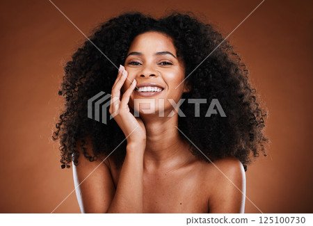 Black woman, hair and portrait with natural beauty smile for healthy cosmetic satisfaction. Beautiful, confident and happy face of skincare girl with afro hair care texture in brown studio. Black woman, hair and portrait with natural beauty smile for healthy cosmetic satisfaction. Beautiful, confident and happy face of skincare girl with afro hair care texture in brown studio. 125100730