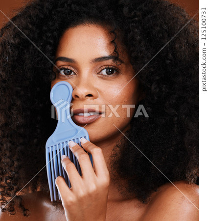 Portrait, black woman and comb for hair care, natural beauty or confident against studio background. African American female, girl and cosmetics for afro, curls or pride for beauty, smile and content Portrait, black woman and comb for hair care, natural beauty or confident against studio background. African American female, girl and cosmetics for afro, curls or pride for beauty, smile and content 125100731