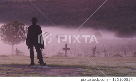 Morning fog over Sad Hill Cemetery. Tourist place in Spain. 125100834