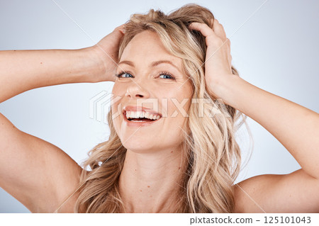 Face, portrait and hair with a model woman in studio on a gray background for natural haircare or treatment. Beauty, hairstyle and keratin with an attractive young female inside for keratin hair care Face, portrait and hair with a model woman in studio on a gray background for natural haircare or treatment. Beauty, hairstyle and keratin with an attractive young female inside for keratin hair care 125101043