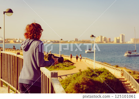 Tourist woman visit Cape Palos in Spain Tourist woman visit Cape Palos in Spain 125101061