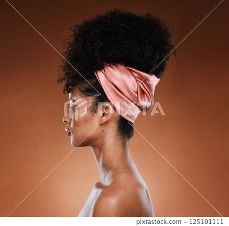 Black woman, profile and hair care beauty with a scarf, makeup and natural afro against a brown studio background. Fashion, cosmetics and skin wellness, health. and facial cosmetic, female and model 125101111