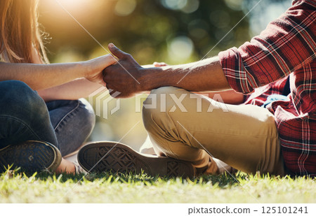 Diverse, couple and holding hands in a park for love, care and affection in a summer garden or park. Interracial man and woman bonding while hold hand for vacation getwaway in a natural environment Diverse, couple and holding hands in a park for love, care and affection in a summer garden or park. Interracial man and woman bonding while hold hand for vacation getwaway in a natural environment 125101241