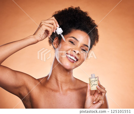 Skincare serum, essential oil and black woman in studio portrait with cosmetics product for healthy glow, shine and facial promotion. Young woman model with hyaluronic acid, liquid oil for face care Skincare serum, essential oil and black woman in studio portrait with cosmetics product for healthy glow, shine and facial promotion. Young woman model with hyaluronic acid, liquid oil for face care 125101551