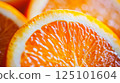 Juicy Orange Slice with Vibrant Color in Natural Light 125101604