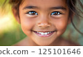 Close-Up of Smiling Child with Happy Expression 125101646
