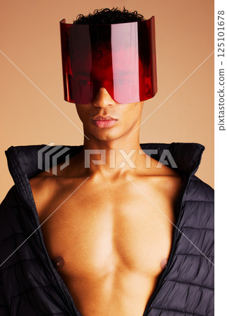 Beauty, futuristic fashion and man in sunglasses with creative cyberpunk style, modern accessory and trend setting sci fi eyewear. Black man, artistic red glass visor and future of edgy new clothing Beauty, futuristic fashion and man in sunglasses with creative cyberpunk style, modern accessory and trend setting sci fi eyewear. Black man, artistic red glass visor and future of edgy new clothing 125101678