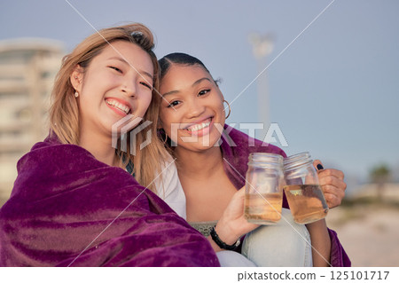 Friends cheers, blanket and relax together in nature for quality time or freedom bonding outdoors. Girlfriends, happy and toasting happiness, love and celebration portrait for memories with drink Friends cheers, blanket and relax together in nature for quality time or freedom bonding outdoors. Girlfriends, happy and toasting happiness, love and celebration portrait for memories with drink 125101717