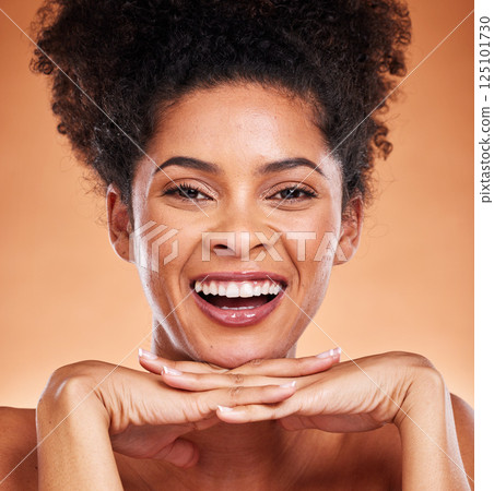 Face, beauty and skincare with a model black woman happy in studio on a beige background for wellness. Luxury, portrait and cosmetics with an attractive young female proud of her treatment routine 125101730