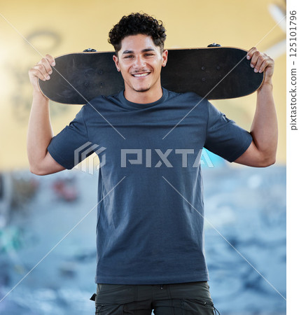 Skateboard, freedom and street sports with man outdoor for skating, exercise and training for competition, wellness and fun at skate park. Portrait of gen z skater with his board for sport and travel 125101796