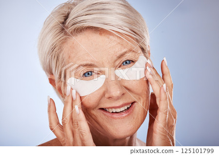 Senior woman with collagen eyes mask for skincare, dermatology and facial wellness on studio mockup marketing or advertising space. Elderly model portrait and eye patches product for antiaging beauty Senior woman with collagen eyes mask for skincare, dermatology and facial wellness on studio mockup marketing or advertising space. Elderly model portrait and eye patches product for antiaging beauty 125101799