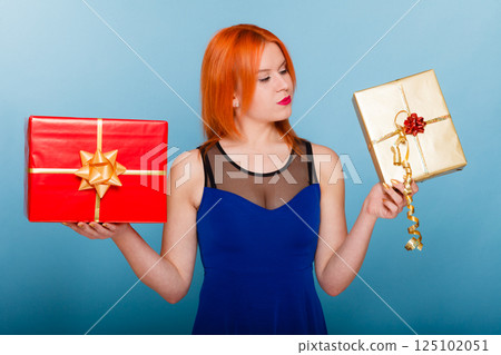 holidays love happiness concept - girl with gift boxes holidays love happiness concept - girl with gift boxes 125102051