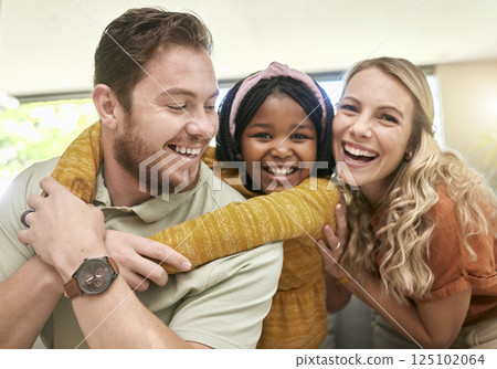 Family, children and adoption with a girl, mother and father bonding in the living room of their home. Portrait, love and smile with happy foster parents and black daughter together in a house Family, children and adoption with a girl, mother and father bonding in the living room of their home. Portrait, love and smile with happy foster parents and black daughter together in a house 125102064