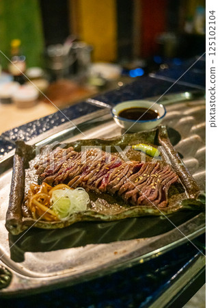 a Japanese grill with beef cutlets a Japanese grill with beef cutlets 125102104