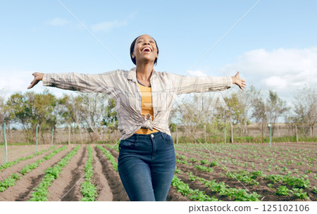 Farm, freedom and black woman feeling carefree and happy on an agriculture, eco friendly and sustainable field. Free, land and farming with african american female enjoying her agricultural harvest 125102106
