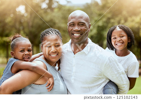 Black family, piggyback and children with a mother and father carrying their daughter siblings outdoor in a park. Portrait, happy and love with a man, woman and kids bonding together in nature Black family, piggyback and children with a mother and father carrying their daughter siblings outdoor in a park. Portrait, happy and love with a man, woman and kids bonding together in nature 125102143