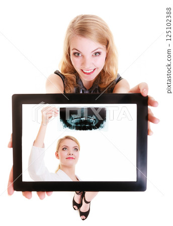 Girl showing doctor on tablet. Medical health care Girl showing doctor on tablet. Medical health care 125102388