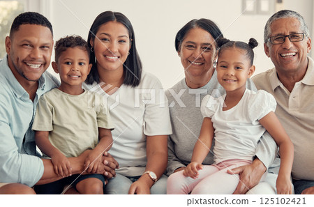 Big family, smile and portrait in home living room for bonding, love or support. Care, happy and grandpa, grandma and parents, kids or children relax in lounge enjoying quality time together in house 125102421