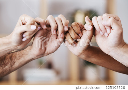 Hands, teamwork and support with a man and woman group holding fingers or thumbs in solidarity. Trust, community and help with a male and female team holding hands together in partnership or care Hands, teamwork and support with a man and woman group holding fingers or thumbs in solidarity. Trust, community and help with a male and female team holding hands together in partnership or care 125102528