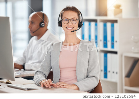Portrait, call center and customer service with a woman consulting using a headset in her telemarketing office. Sales, retail and support with a female consultant at work on a computer for ecommerce Portrait, call center and customer service with a woman consulting using a headset in her telemarketing office. Sales, retail and support with a female consultant at work on a computer for ecommerce 125102584