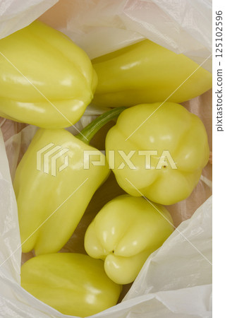 Pale green bell peppers 125102596
