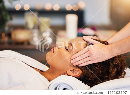 Head massage, woman and relax at spa, facial wellness and luxury zen therapy, reiki and cosmetics skincare. Calm female face, forehead and cosmetology for peace, detox and dermatology at beauty salon Head massage, woman and relax at spa, facial wellness and luxury zen therapy, reiki and cosmetics skincare. Calm female face, forehead and cosmetology for peace, detox and dermatology at beauty salon 125102597