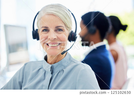 Portrait, call center and senior woman for customer support, conversation or smile in office, talk and happy. Client service, female agent and mature lady with headset for telemarketing or consultant Portrait, call center and senior woman for customer support, conversation or smile in office, talk and happy. Client service, female agent and mature lady with headset for telemarketing or consultant 125102630