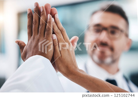 Group high five, diversity and hands together for teamwork, support and collaboration in the workplace. Solidarity, team building and professional friends with a goal, target and mission of success 125102744